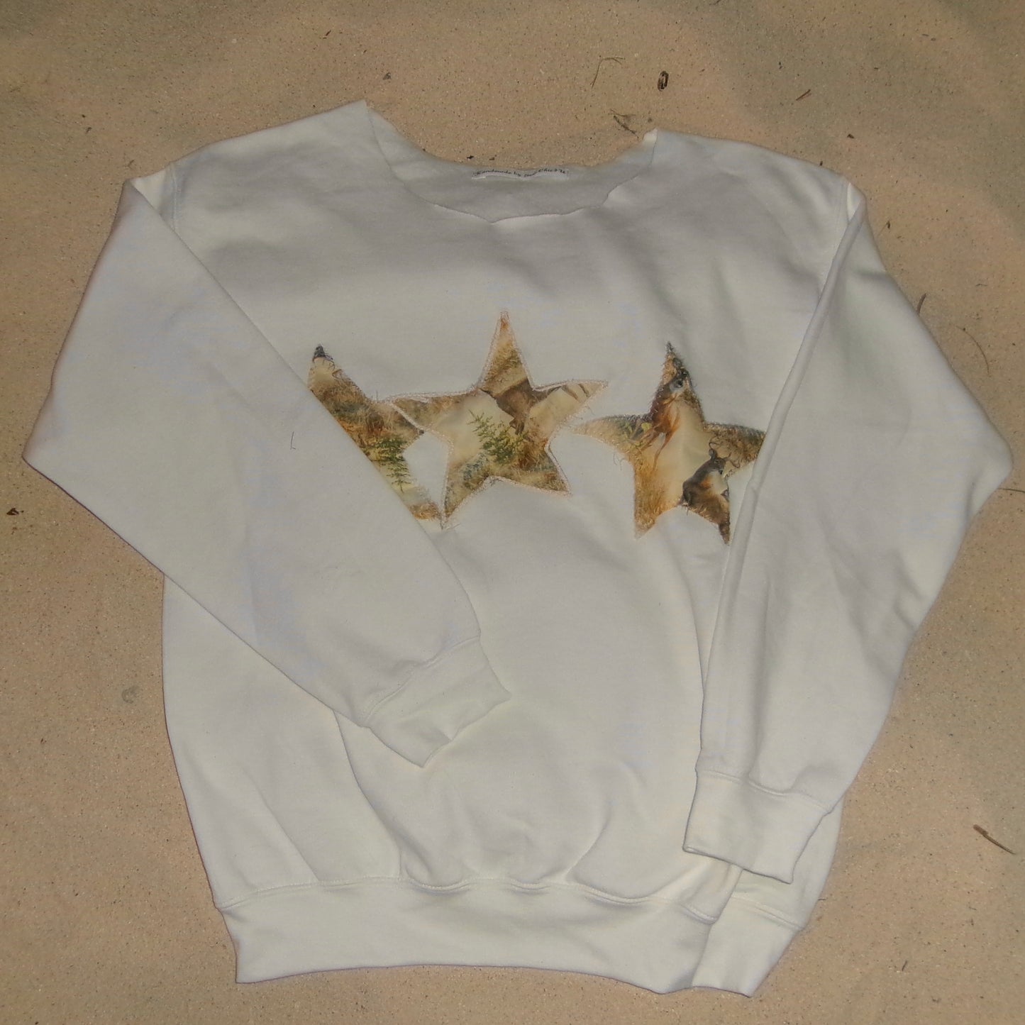 Chic camo off-shoulder star sweatshirt – the perfect blend of comfort and style, with a trendy camo pattern for a casual, fashionable look. SewChic4U