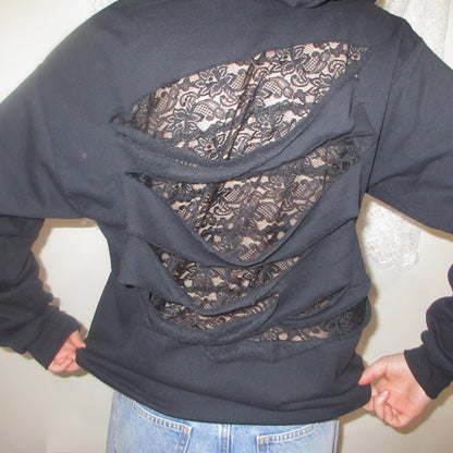 Black hoodie with lace detailing on the back